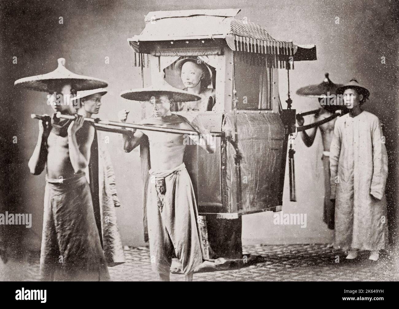 Chinese official in sedan chair, China, c.1880s Stock Photo