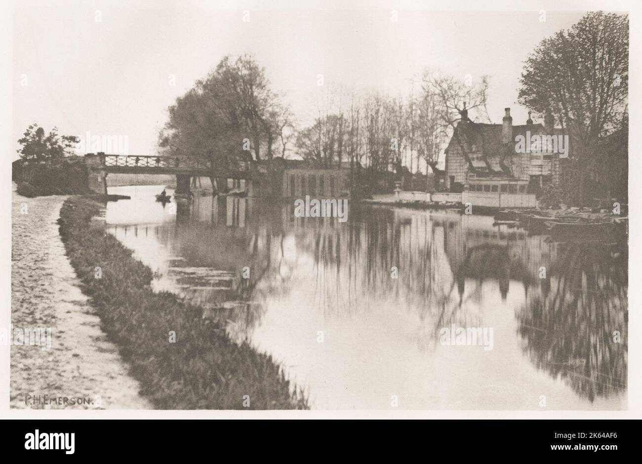 Vintage 19th century/1900's photograph by Peter Henry Emerson. Emerson was a British writer and photographer. His photographs are early examples of promoting straight photography as an art form. He is known for taking photographs that displayed rural settings and for his disputes with the photographic establishment about the purpose and meaning of photography. River Bank scene, Norfolk? Stock Photo
