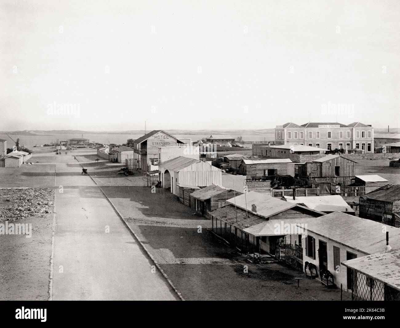 Vintage 19th century photograph: waterfront view, hotel Pagnon, Port Said, Suez Canal, Egypt. Stock Photo