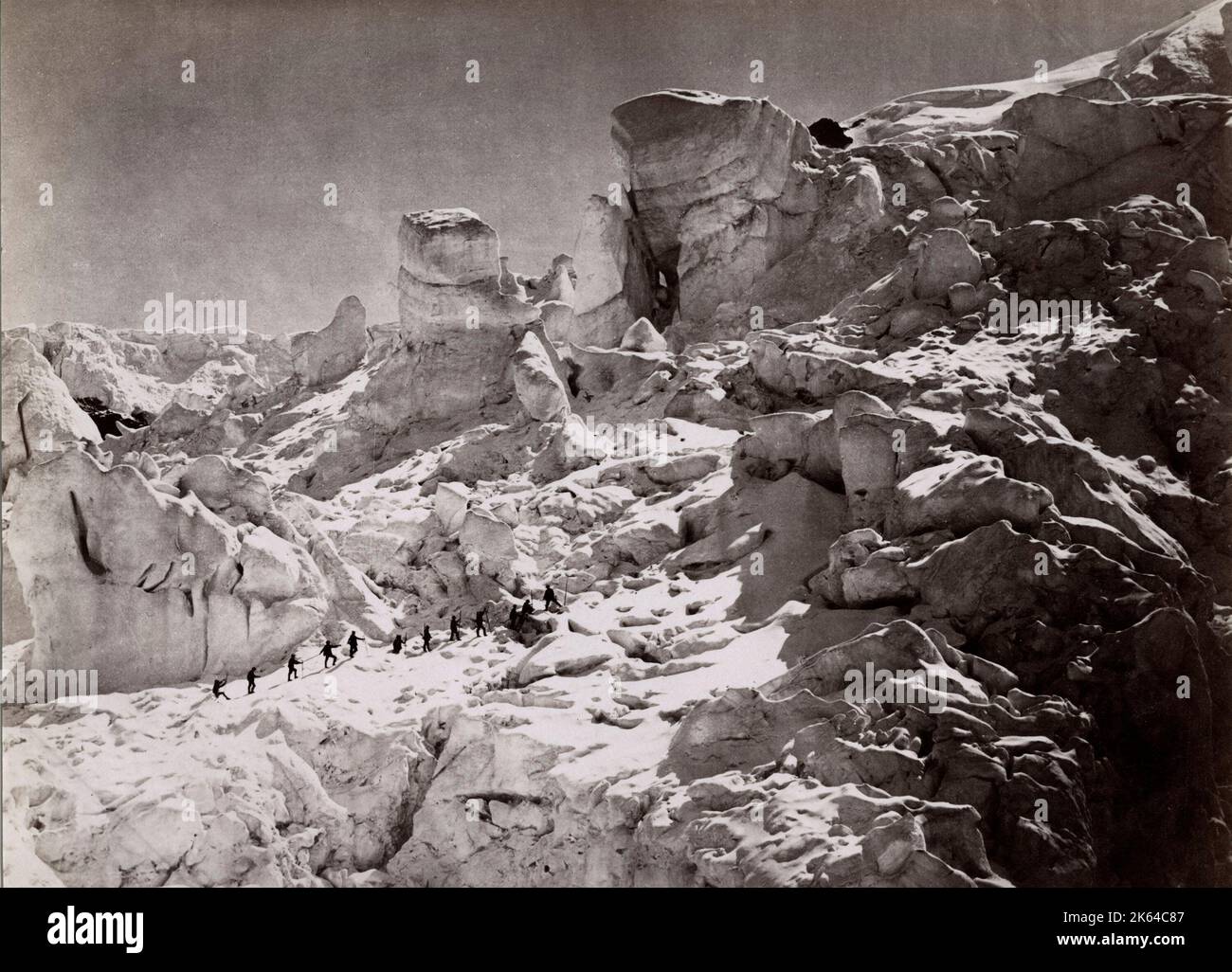 Late 19th century photograph - Climbing the the Alps, climbers roped. Stock Photo