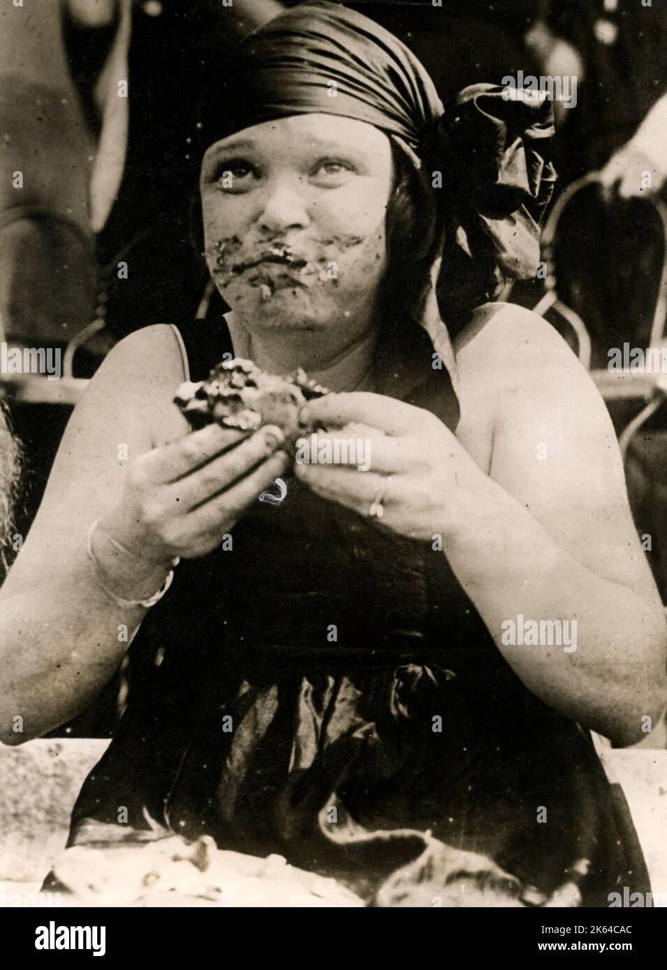 Female contestant in the pie eating contest, at the National Bathing