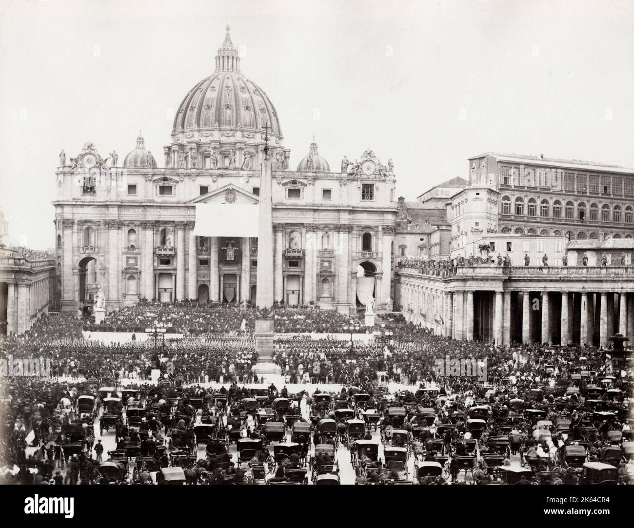 Vintage 19th century photograph - large crowd in St. Peter's Square for a blessing by the Pope from the Vatican. Most liklely Leo XIII. Stock Photo