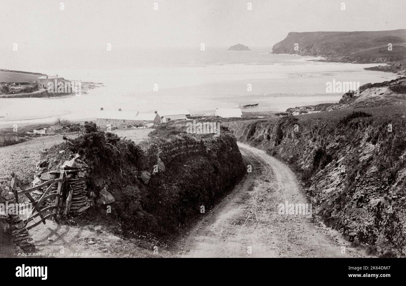 19th century vintage photograph: Polzeath Bay, Cornwall. Polzeath; Cornish: Polsegh, is a small seaside resort village in the civil parish of St Minver in Cornwall, England, United Kingdom. Stock Photo