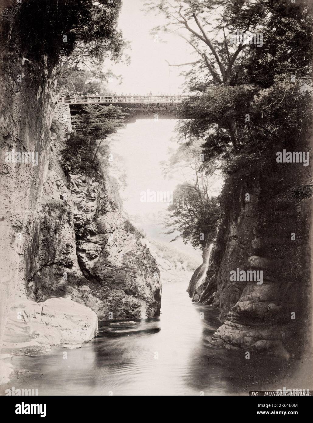 Vintage 19th century photograph: Monkey Bridge, high level wooden bridge over a gorge, Japan. Stock Photo
