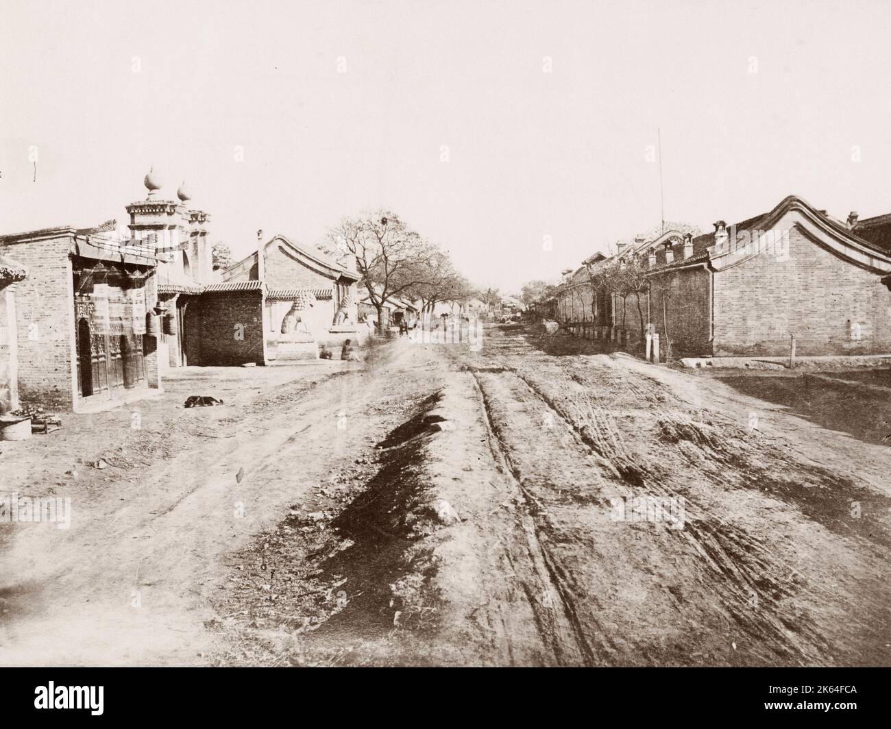 Vintage 19th century photograph: Street with cart ruts, Peking, Beijing, China. Stock Photo