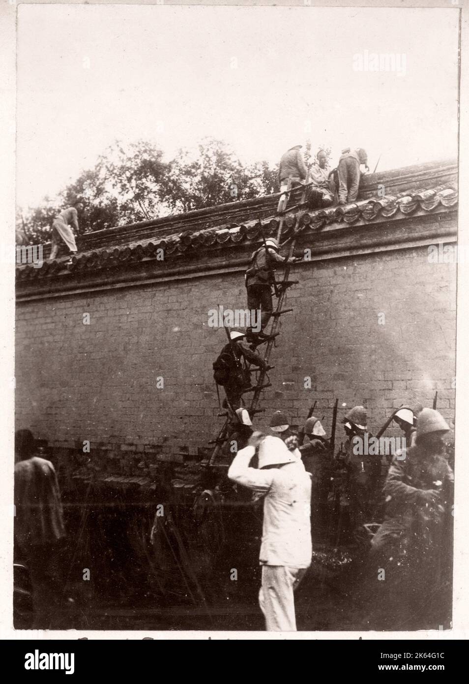 Vintage Photograph China c.1900 - Boxer rebellion or uprising, Yihetuan Movement - image from an album of a British soldier who took part of the supression of the uprising - international troops attacking. Peking/Beijing Stock Photo