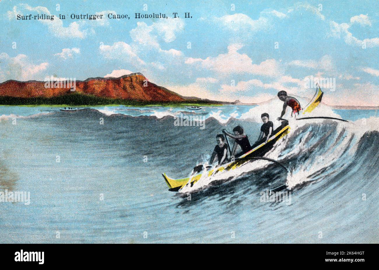 Surfing in an outrigger canoe, Waikiki Beach, Honolulu, Hawaii, USA