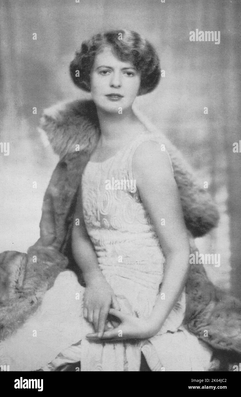 May Meyrick, later Countess of Kinnoull, eldest daughter of famed nightclub owner, Kate Meyrick pictured before her marriage to George Hay, 14th Earl of Kinnoull in 1927. Kate Evelyn 'Ma' Meyrick (1875 -1933), an Irish business woman and 'Queen' of the London nightclub scene. She ran '43', a late-night jazz club at 43 Gerrard Street in Soho, was prosecuted several times for breaching licensing laws and went to prison for bribing policemen to ignore these breaches. Her book 'Secrets of the 43' was banned on its publication in 1933. Three of her daughters married peers of the realm. May was invo Stock Photo