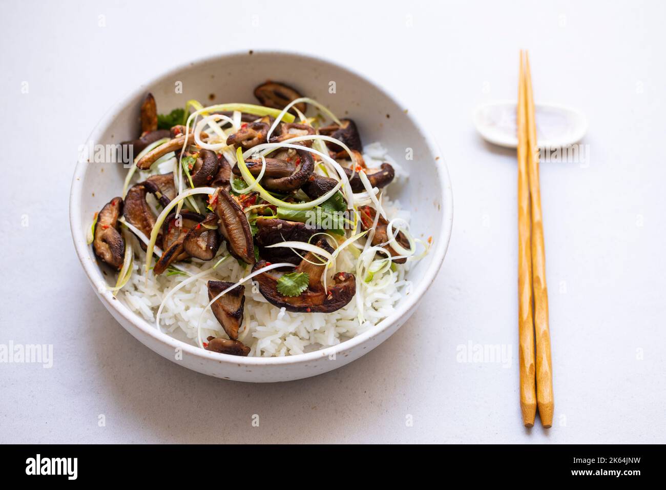 Rice with spicy shiitake mushrooms and spring onions Stock Photo Alamy