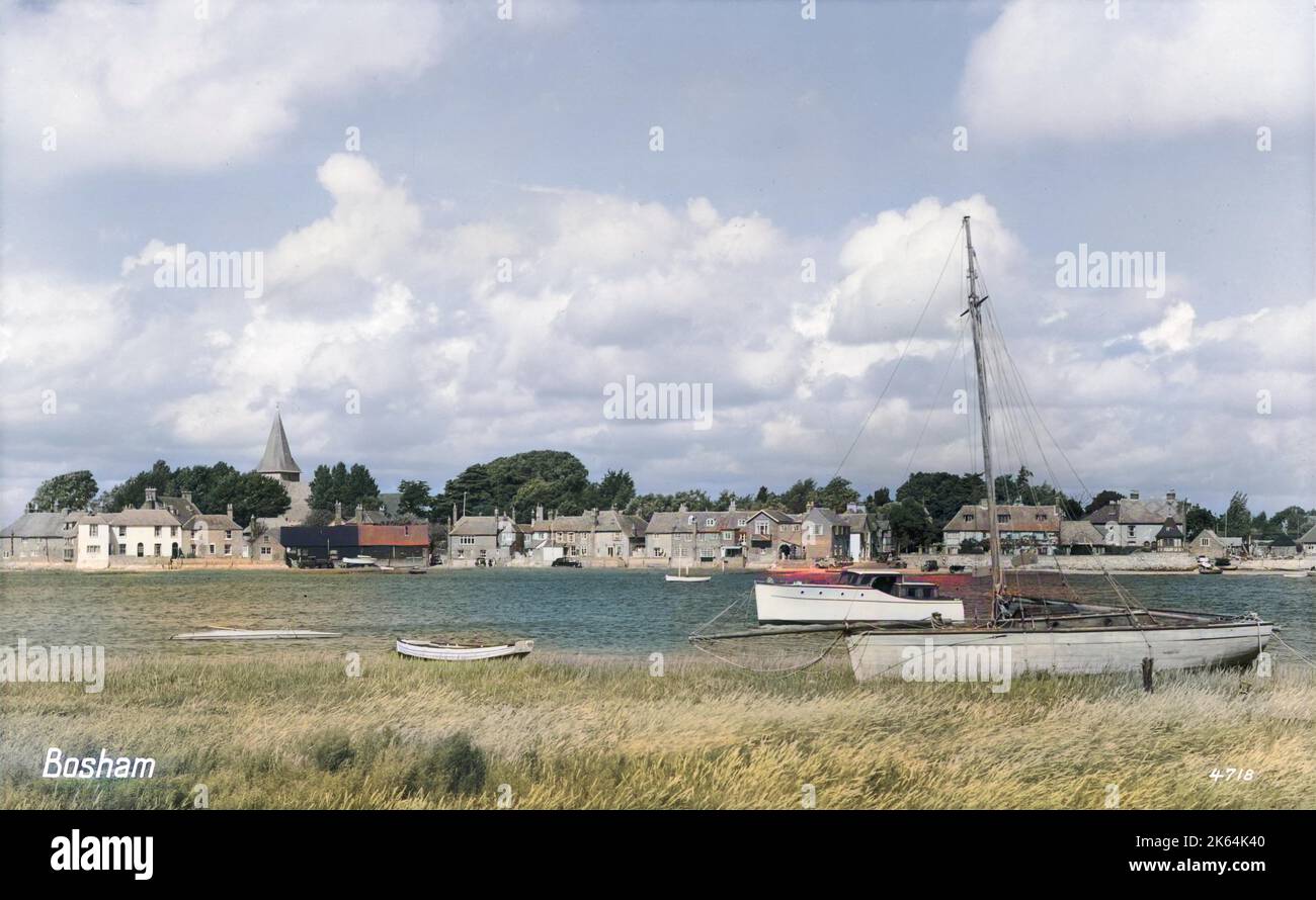 Low tide at Bosham, West, Sussex - a view of this charming coastal village, the site of King Canute's aborted attempt to hold back the tide.     Date: circa 1950s Stock Photo