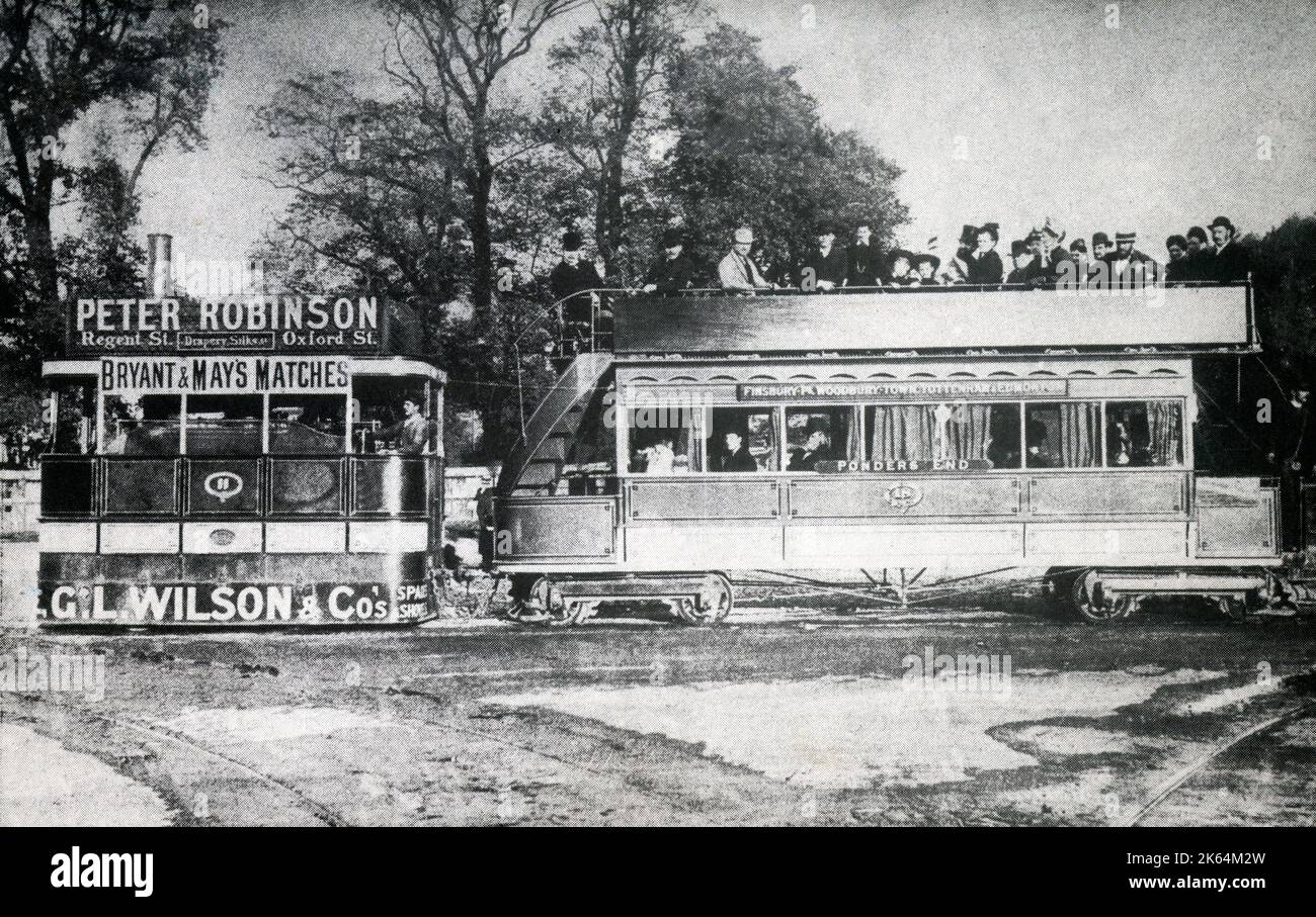 Steam tram at Tottenham High Road, London. Introduction on the Edmonton-Finsbury Park route began in 1885. By 1890, the steam trams were replaced by the first electric trams. Stock Photo