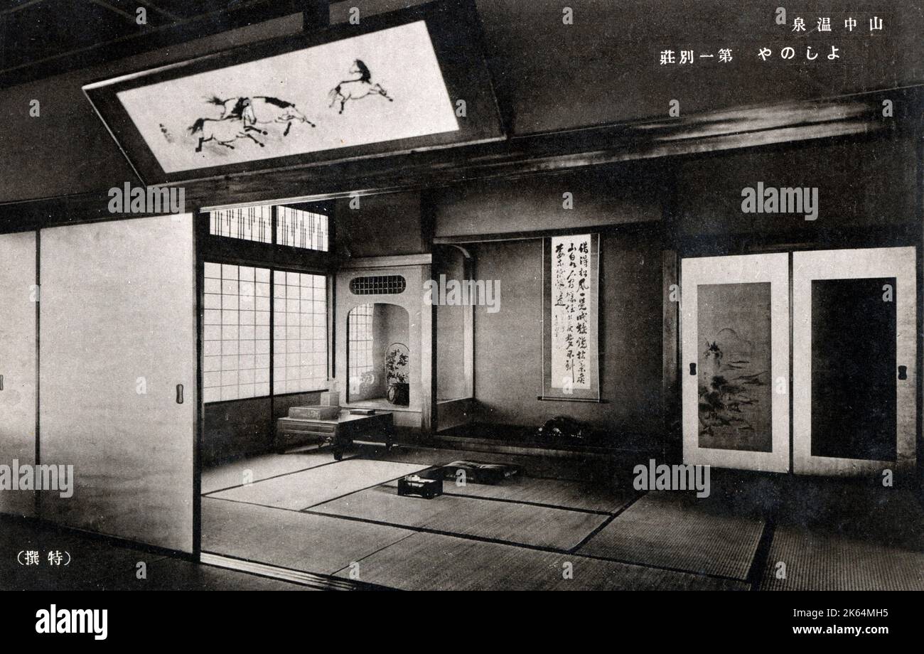 Traditional Japanese-style rooms (washitsu) come with a unique interior design that includes tatami mats as flooring. An example from an Onsen (Hot Springs) Hotel. This style dates back to the Muromachi Period when they originally served as study rooms for the wealthy before gradually becoming more commonplace as reception and living quarters.     Date: circa 1920s Stock Photo