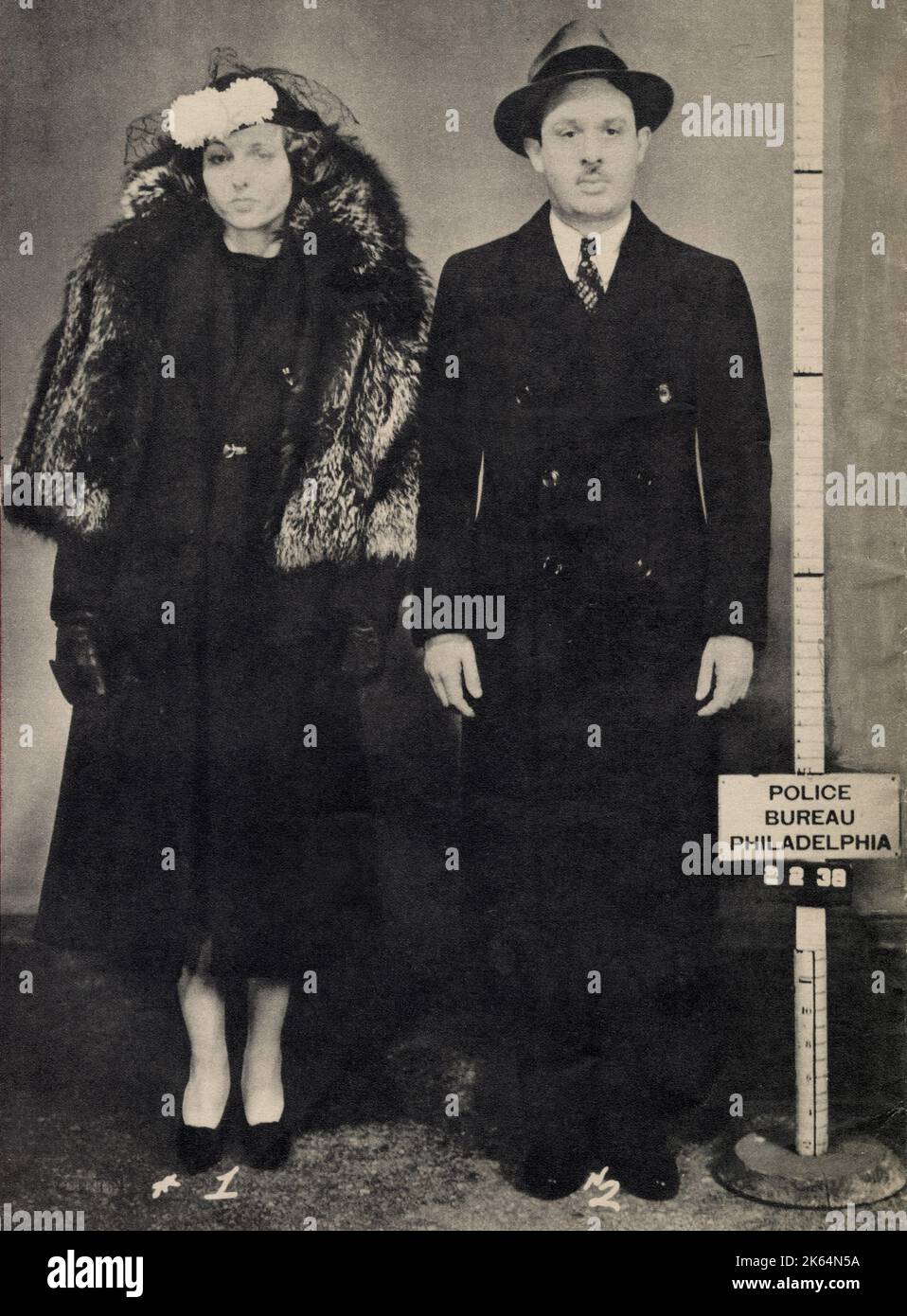 Richard 'Dixie' Davis (right), mob lawyer, and his mistress Hope Dare (born Rose Luetzsinger in 1909 in Ohio) after their arrest in February 1939. Stock Photo