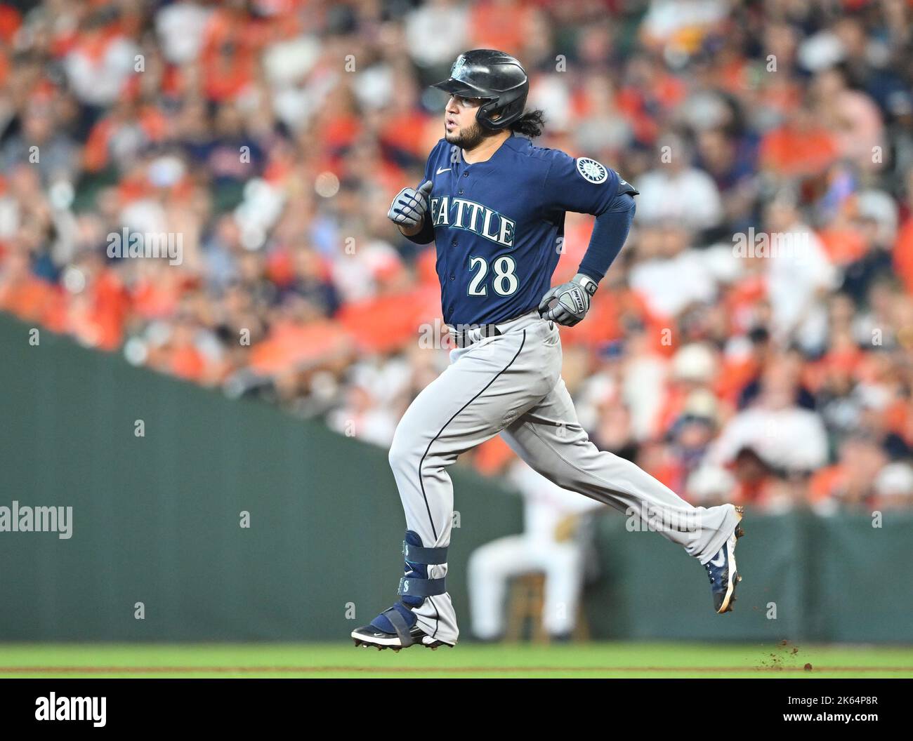 Seattle Mariners third baseman Eugenio Suarez jogs the bases after hitting  a home run against the Washington Nationals in a baseball game Monday, June  26, 2023, in Seattle. The Mariners won 8-4. (