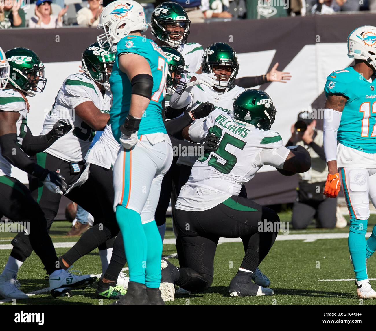 East Rutherford, New Jersey, USA. 9th Oct, 2022. New York Jets defensive  tackle Quinnen Williams (95) and defense celebrate his fumble recovery  during a NFL game against the Miami Dolphins at MetLife