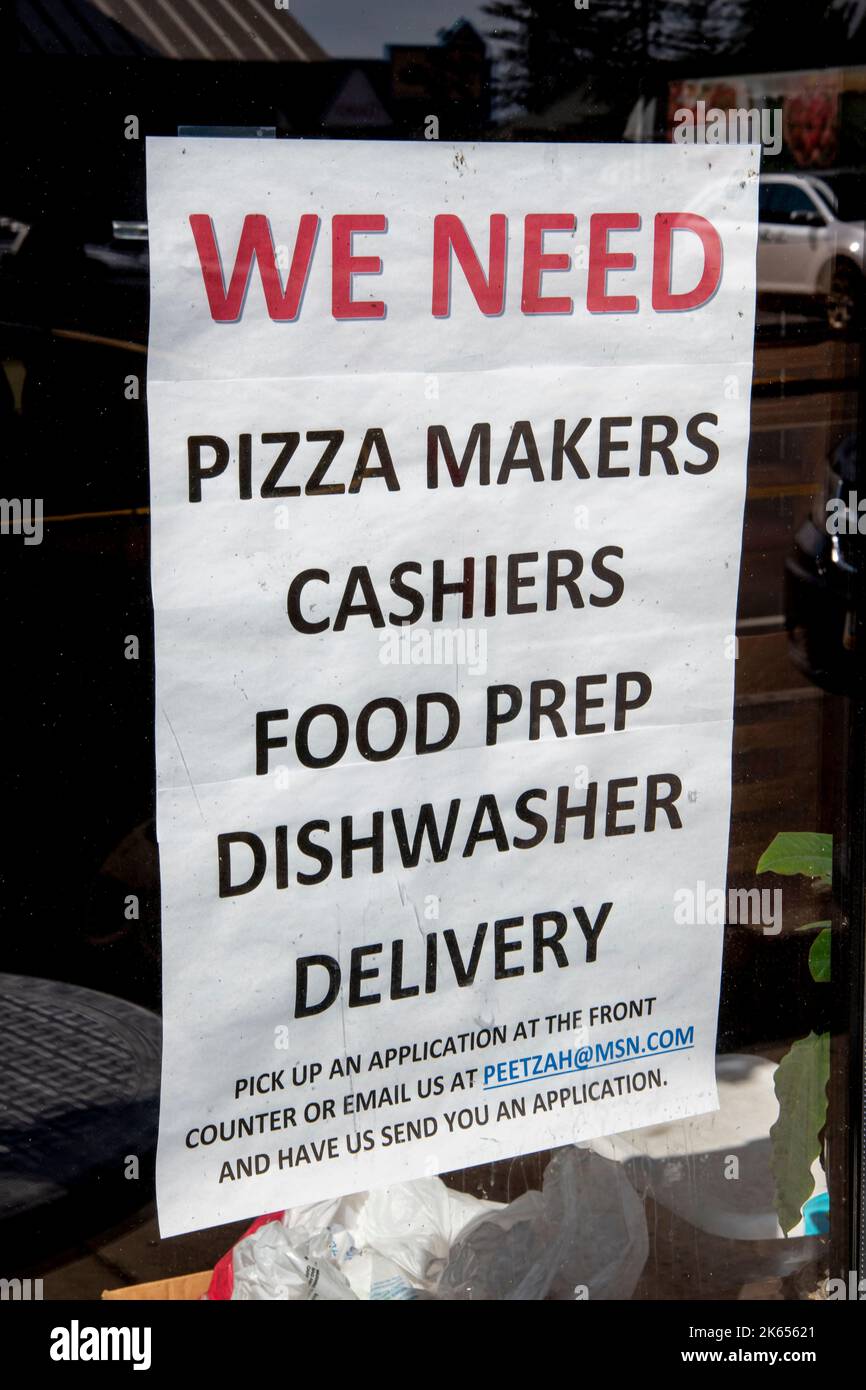 Grand Marais, Minnesota. Sven & Ole's Pizzas window sign looking for