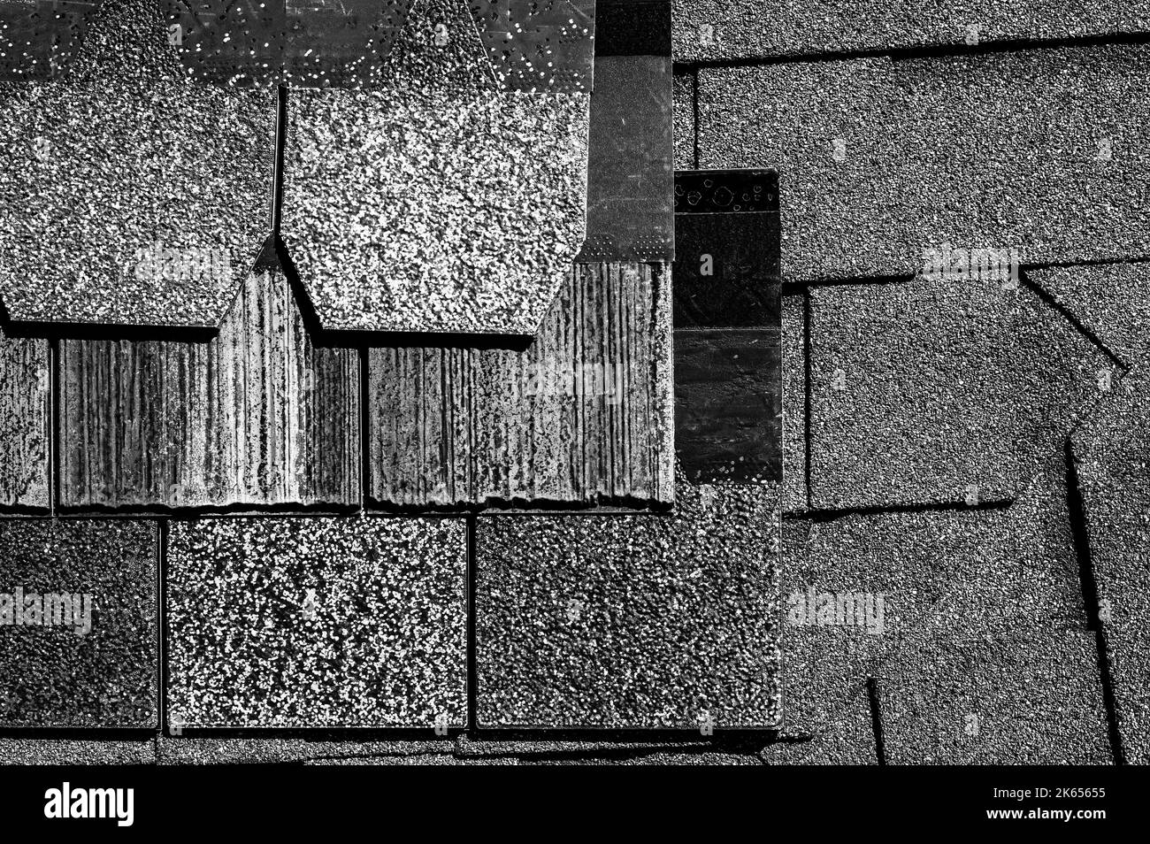 Assorted selection of premium synthetic roof shingles to pick a new