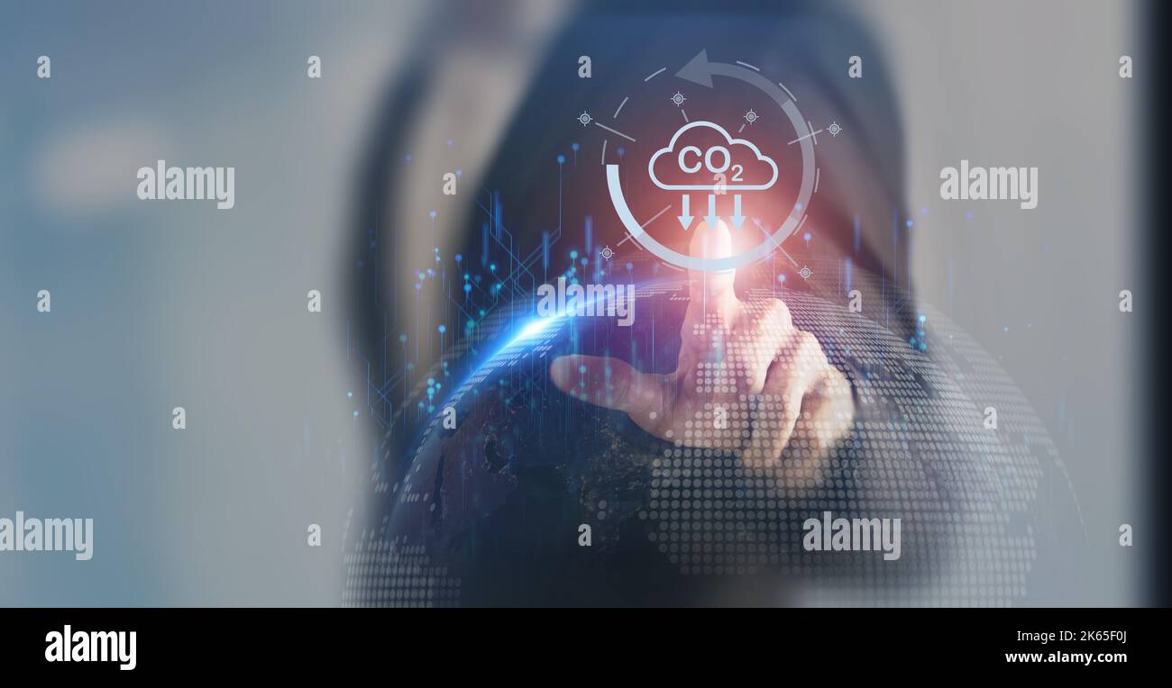 Carbon neutrality technology. Reduction of carbon emissions concept. Net zero greenhouse gas emissions target. Reducing carbon footprint. Limit global Stock Photo
