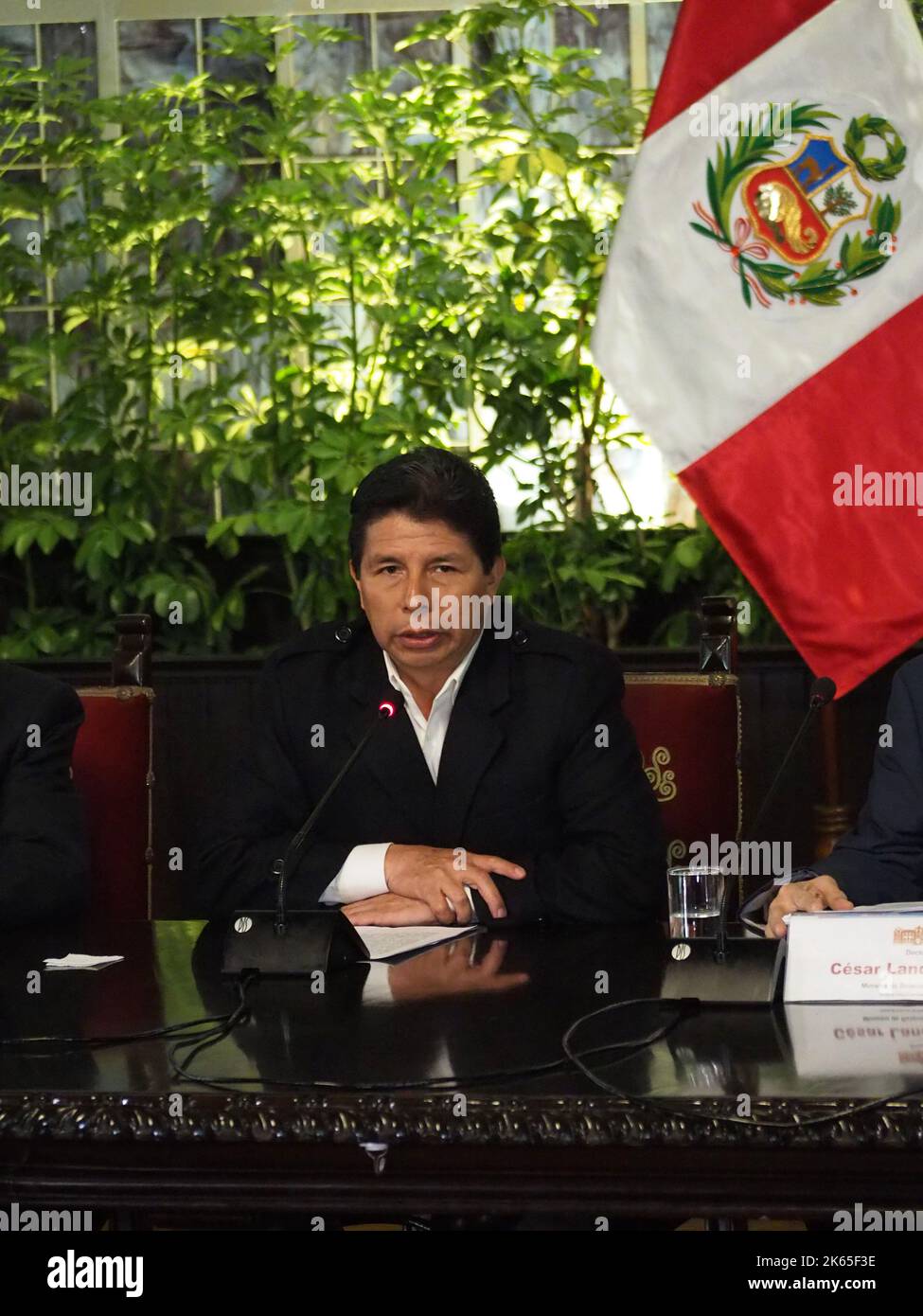 Pedro Castillo, president of Peru, gives an emergency press conference to foreign correspondents accredited in Peru and denounces as an attempted coup d'état being constitutionally denounced by the nation's prosecutor for allegedly leading a criminal organization Stock Photo