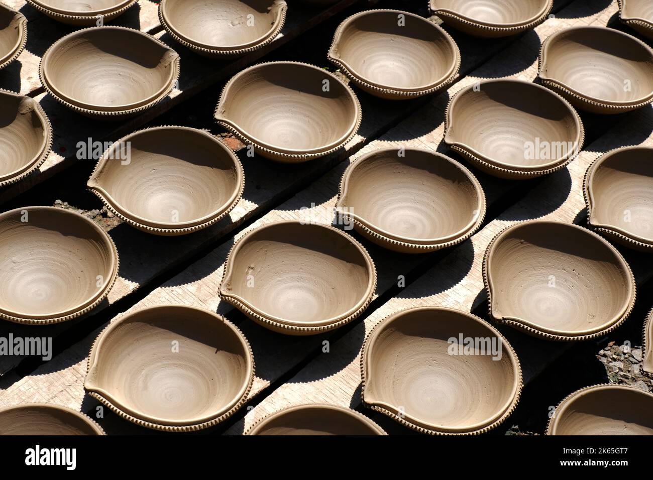 9 October 2022, Pune, India, Indian potter making Diya (oil lamps) or