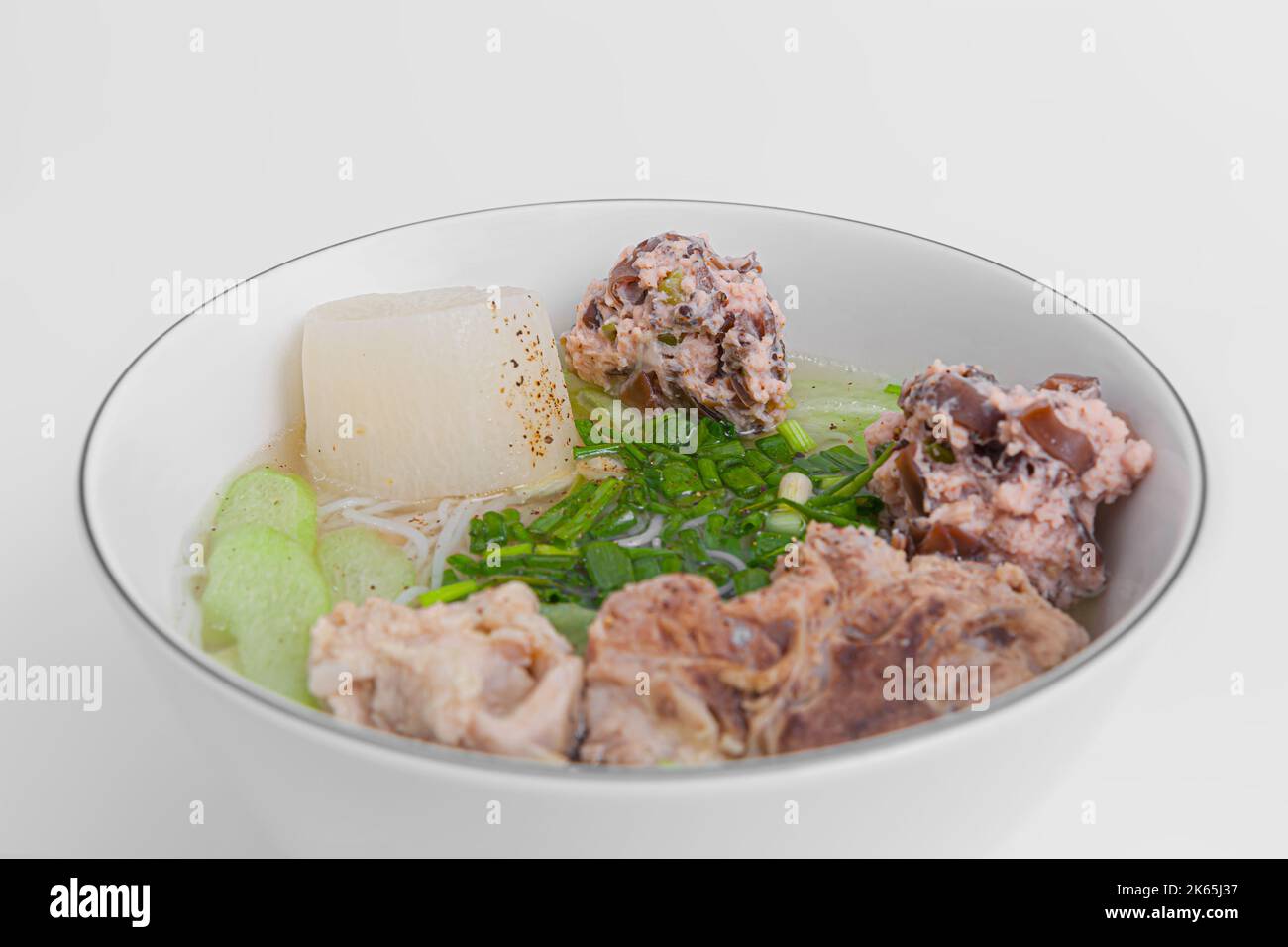 Bun Moc, Rice noodle soup with pork ball, Vietnamese food isolated on white background, close-up Stock Photo