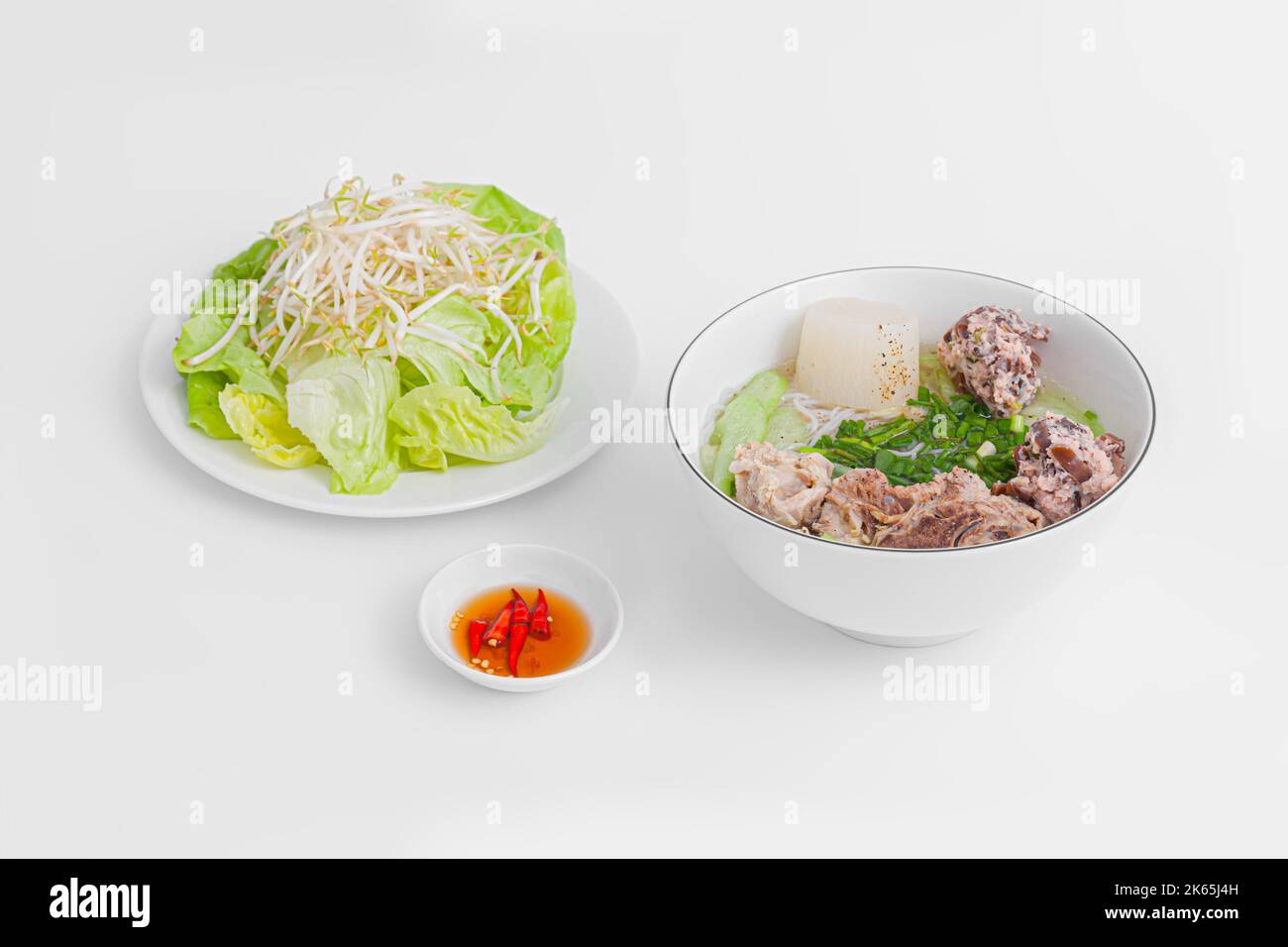 Bun Moc, Rice noodle soup with pork ball, Vietnamese food isolated on white background, perspective view Stock Photo