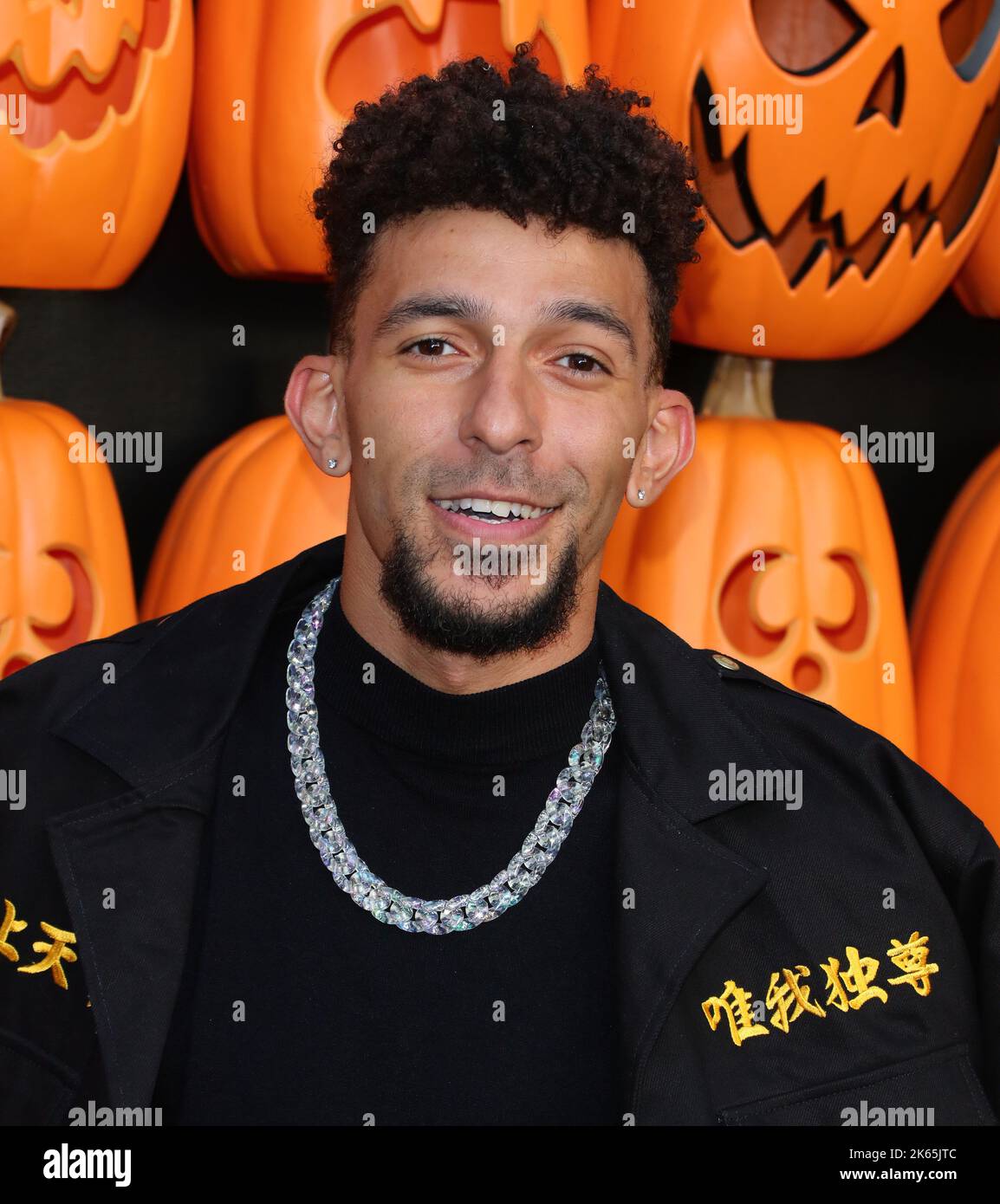 Khleo Thomas arrives at The World Premiere of HALLOWEEN ENDS held at