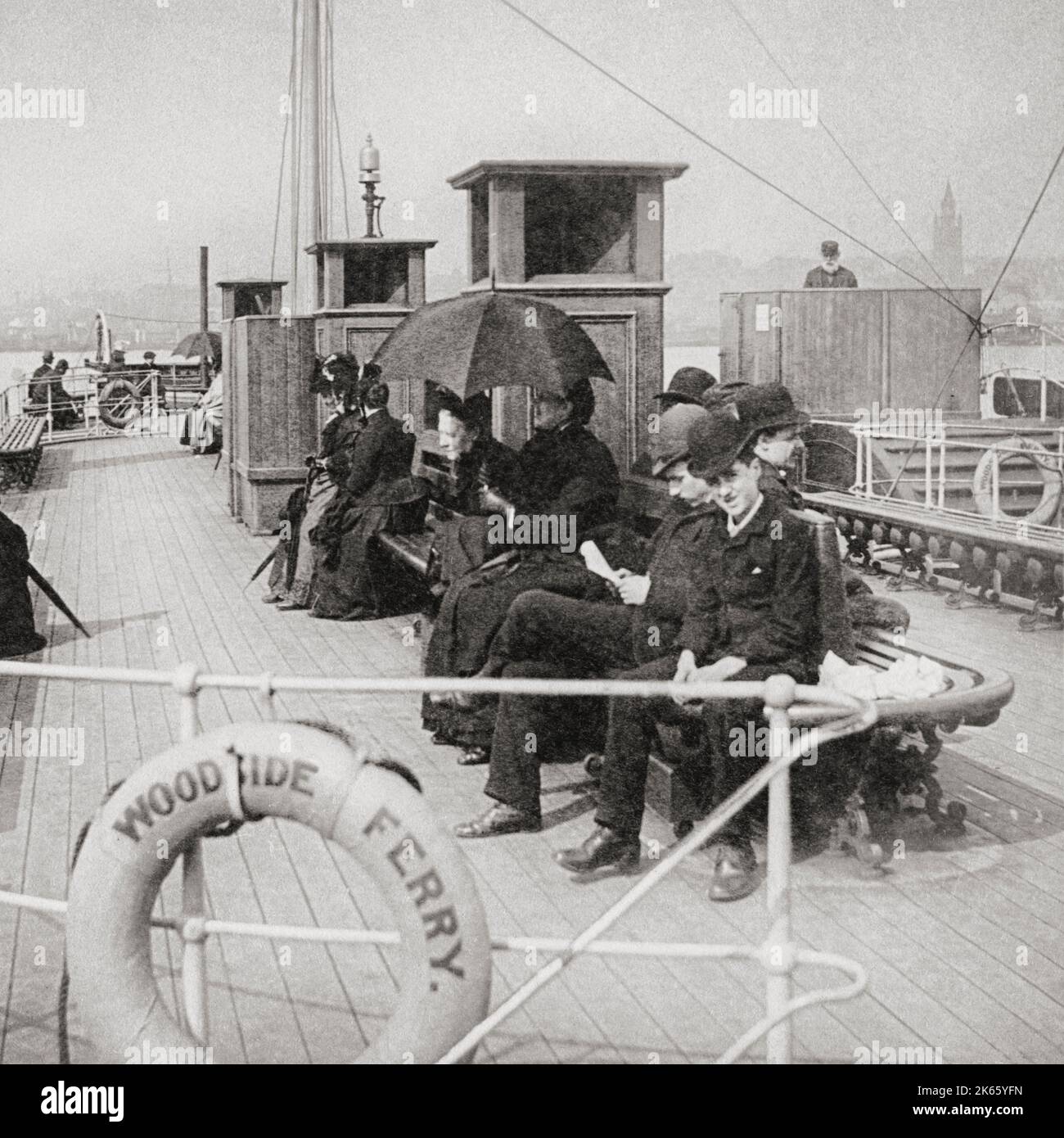 A late 19th century view of passengers on the Woodside Ferry crossing the River Mersey to Liverpool, England. Stock Photo
