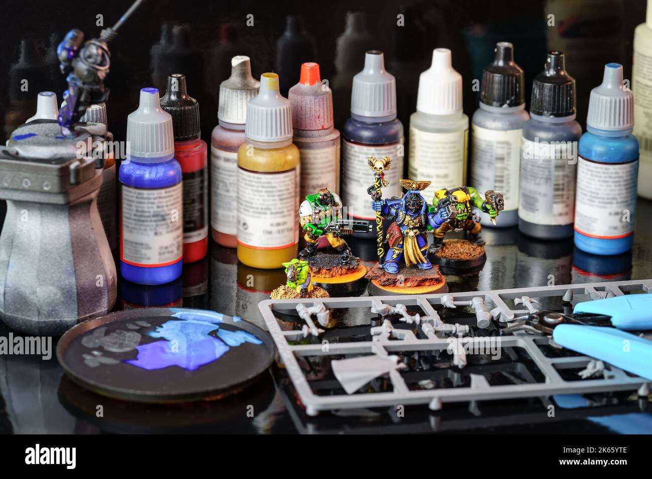 Set of products for painting and assembly of small figures used in role-playing board games. Stock Photo