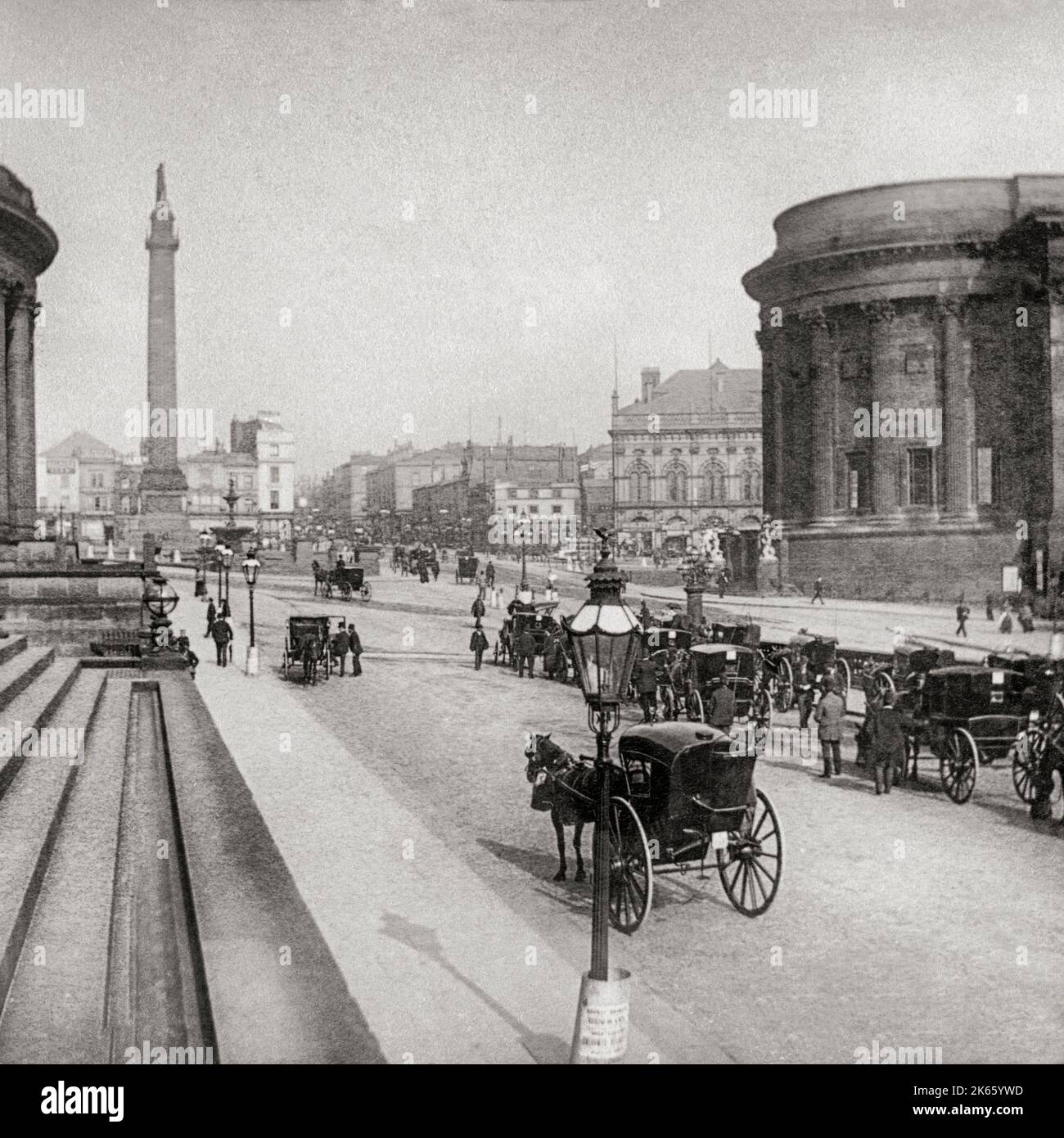 An early 20th century view of William Brown Street, from the William Brown Library, showing the northern end of St George's Hall and the Wellington Monument in Liverpool City centre, England Stock Photo