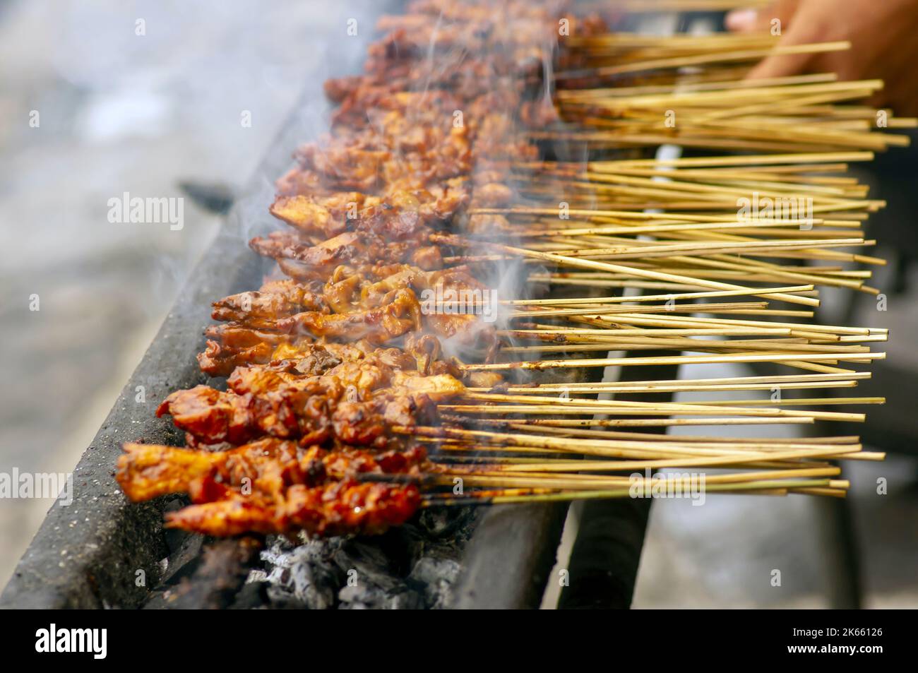Sate Ayam or Chicken Satay, a traditional satay from Yogyakarta, Indonesia, in shallow focus and