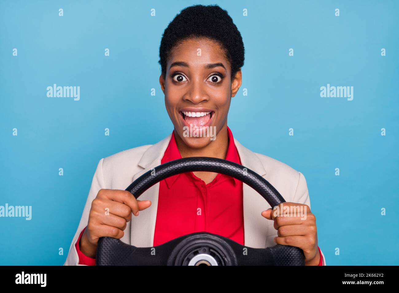 Portrait of astonished excited person hold wheel open mouth isolated on ...