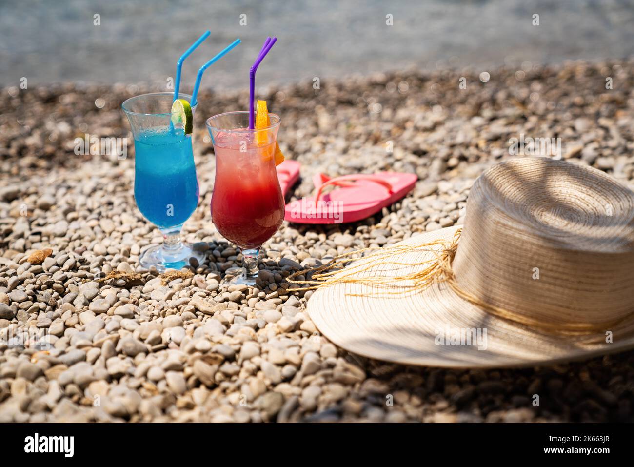 Beach background with a cocktail by the sea. Travel people vacation