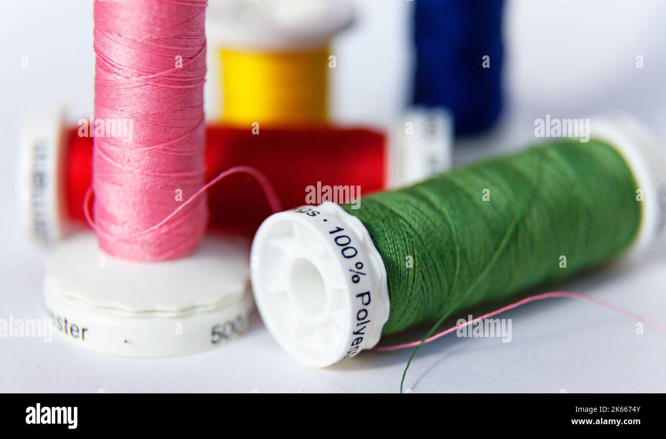 sewing thread in different colors and 100 percent polyester Stock Photo