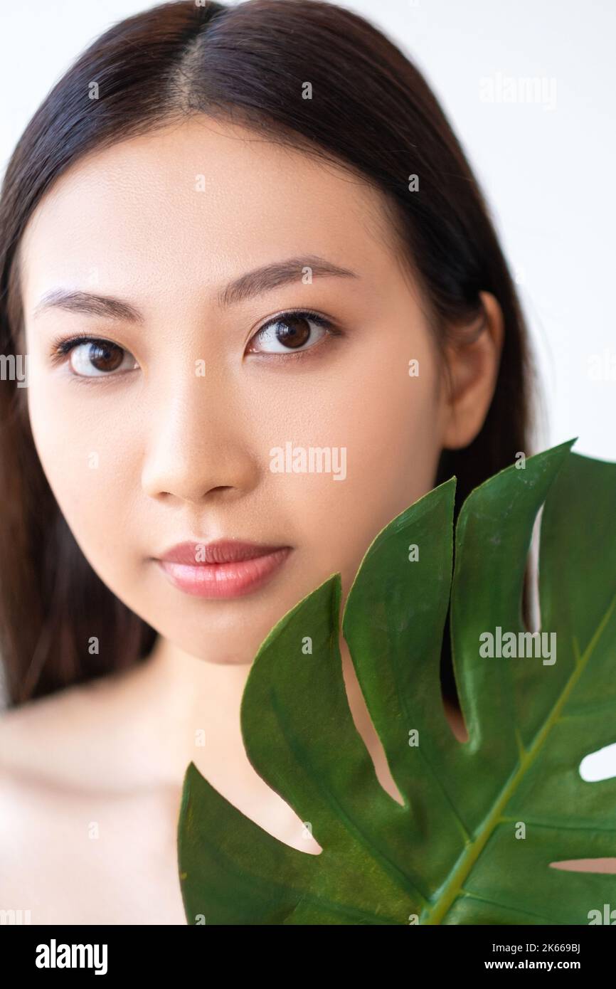 natural skincare spa therapy woman face green leaf Stock Photo