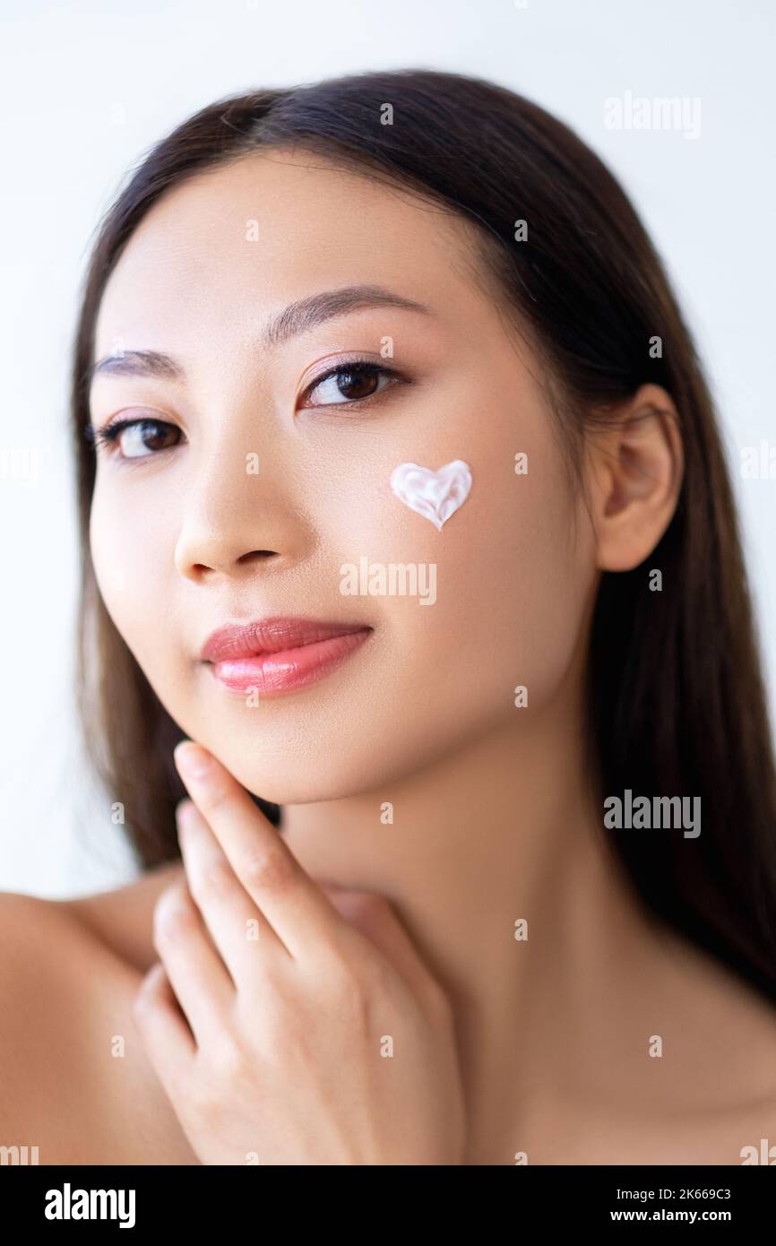 beauty portrait skincare cosmetology woman cream Stock Photo