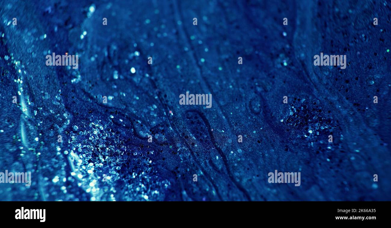 glitter fluid wet ink texture blue paint Stock Photo Alamy