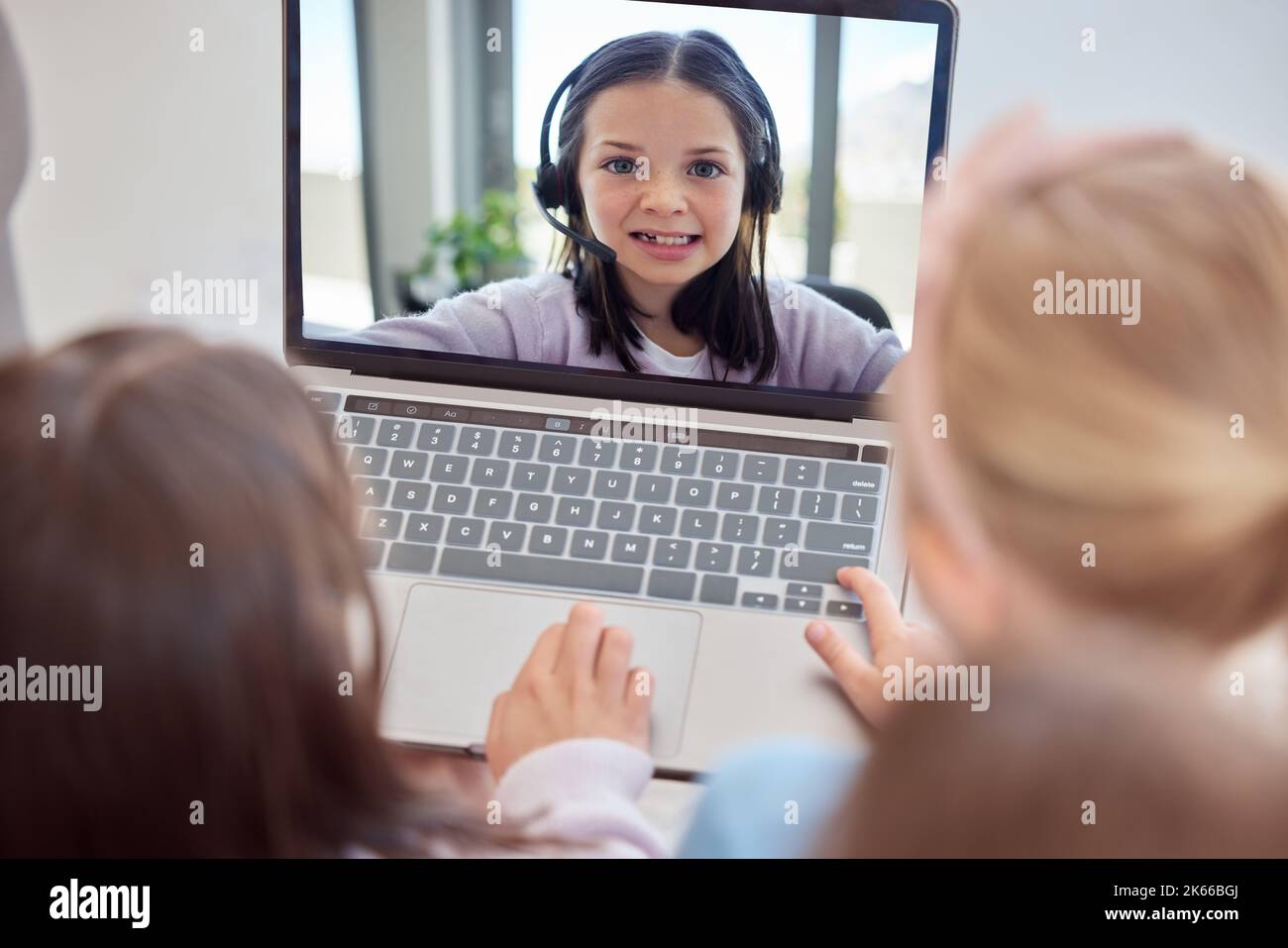 One happy little caucasian girl wearing headphones while appearing on a ...