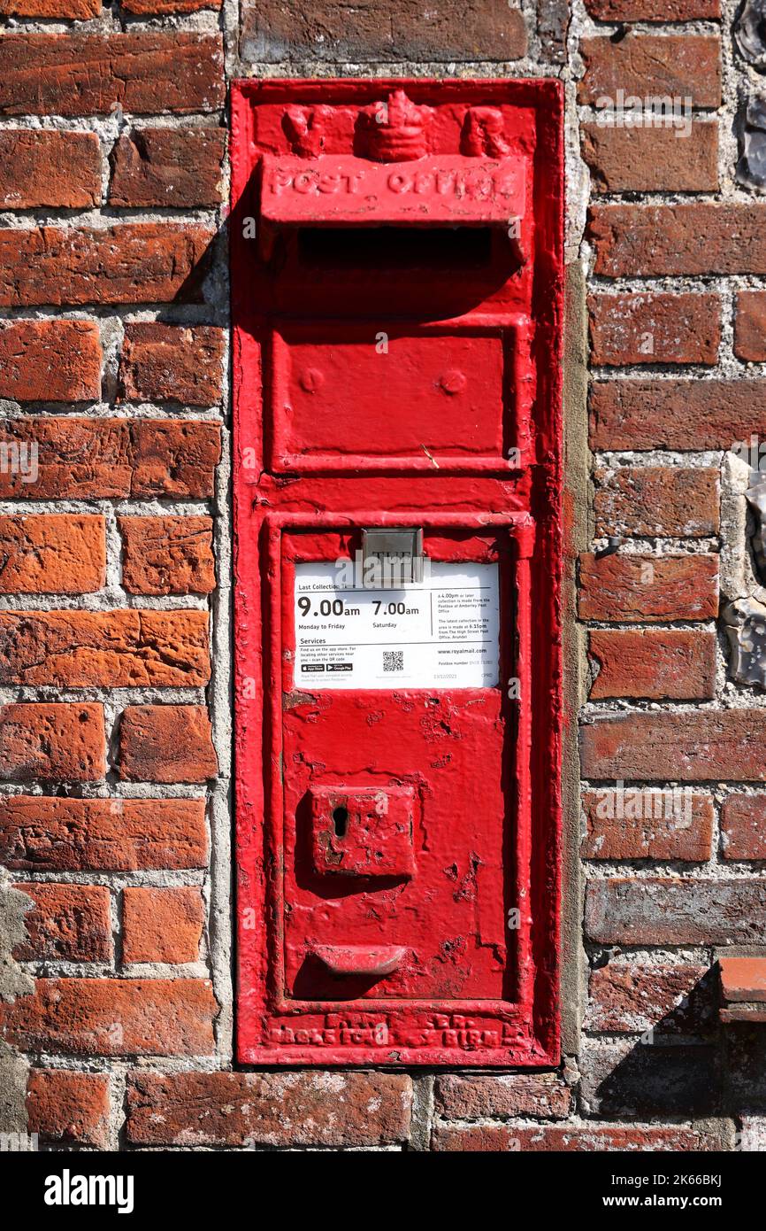 General views of old, small, village post boxes in Houghton, West Sussex, UK. Stock Photo