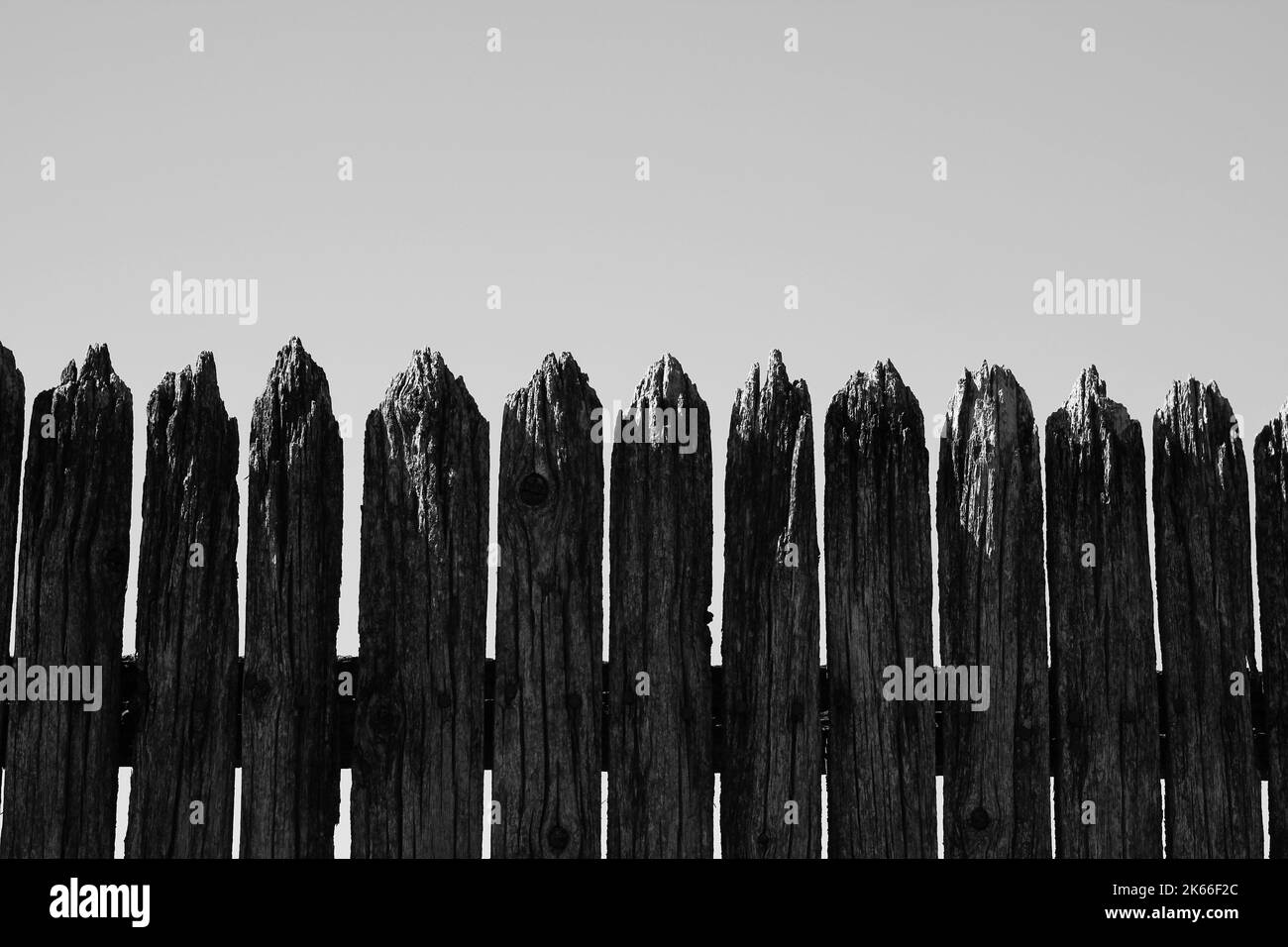 Solid wood fence Black and White Stock Photos & Images - Alamy
