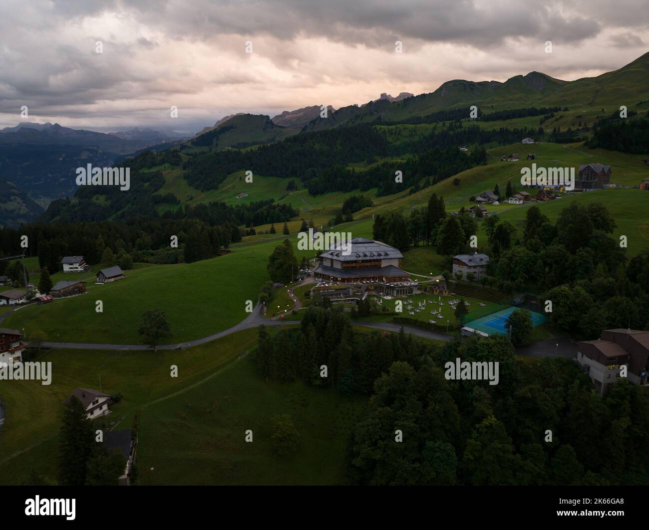 Stoos Ridge Sunset Swiss mountain village Stoos at sunset aerial drone overview in canton ...