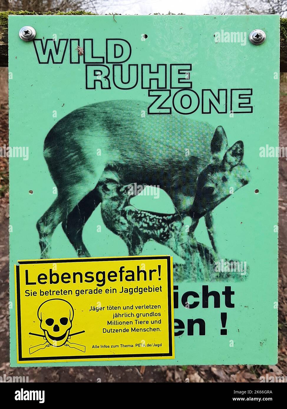 sticker against hunting on a sign Wild Rest Zone, Germany Stock Photo