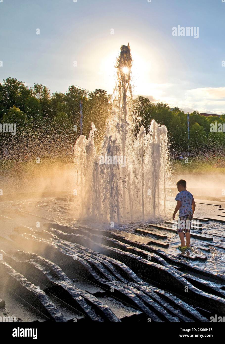boy at the Fountain in the Lustgarten, Museums Island, Germany, Berlin Stock Photo