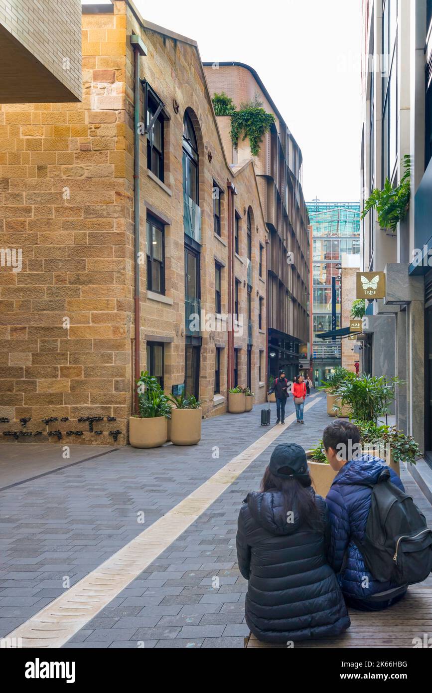 July 2022: People enjoying one of the laneways (Loftus Lane) that form part of the new Quay Quarter area near Circular Quay in Sydney City, Australia Stock Photo