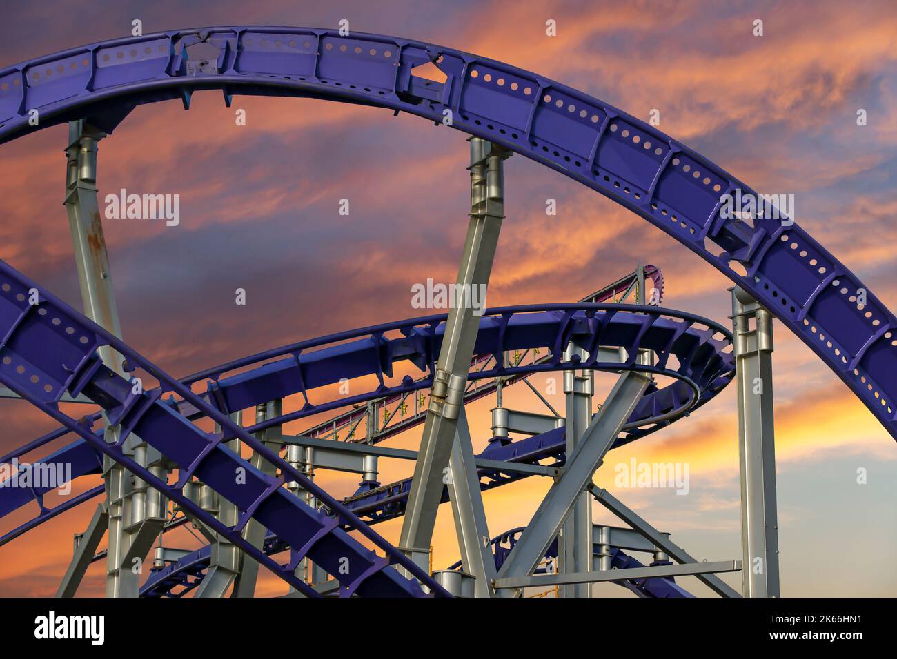 Attraction rollercoaster (switchback) against the background of a