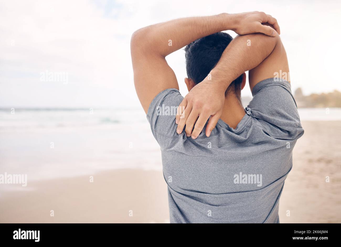 Flex arms, stretch legs, turn heads. Rearview shot of a sporty young