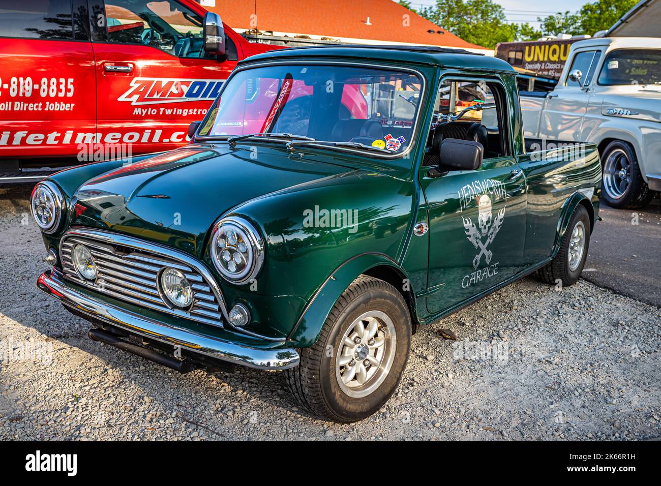Falcon Heights, MN - June 19, 2022: High perspective front corner view of a 1964 Austin Mini Pickup Truck at a local car show. Stock Photo
