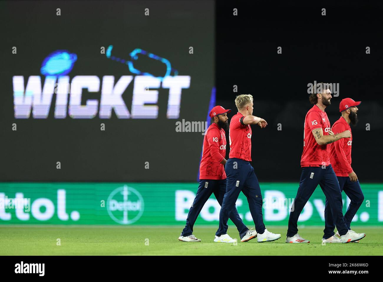 Sam Curran of England dismisses Glenn Maxwell of Australia during the Dettol T20I Series 2 of 3 match Australia vs England at Manuka Oval, Canberra, Australia, 12th October 2022  (Photo by Patrick Hoelscher/News Images) Stock Photo