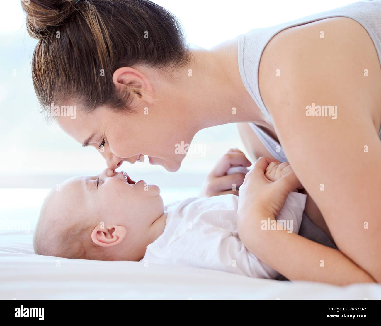 You posses every trait that I lack. a young mother bonding with her adorable baby boy at home. Stock Photo