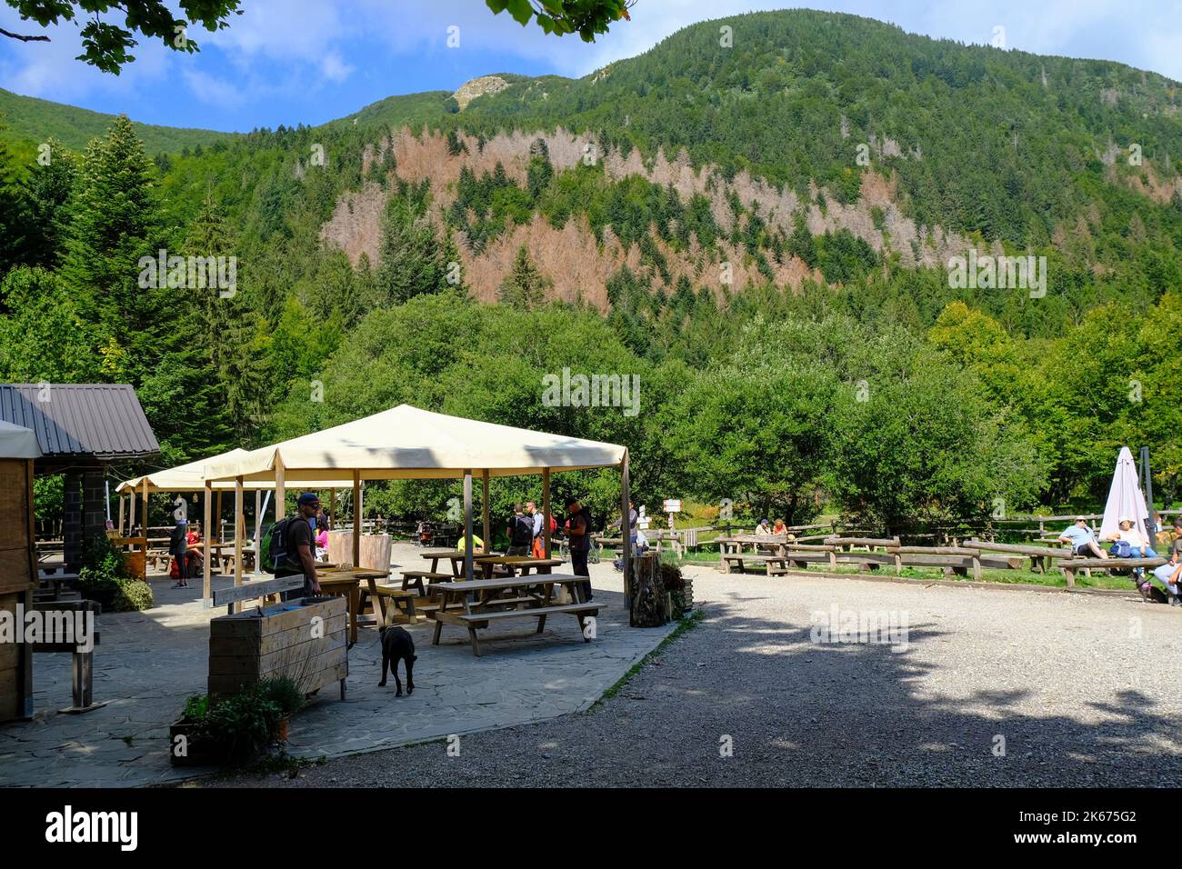 SHELTER IN THE MOUNTAINS WITH TOURISTS. LAGDEI, PARMA Stock Photo